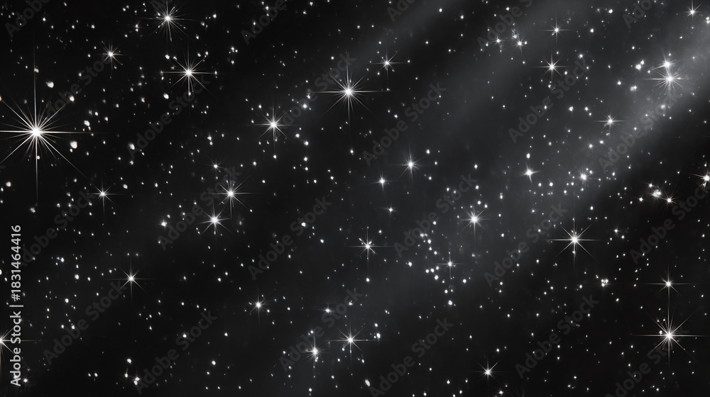 Fototapeta premium A captivating view of a star filled night sky with bright stars and dark nebula clouds