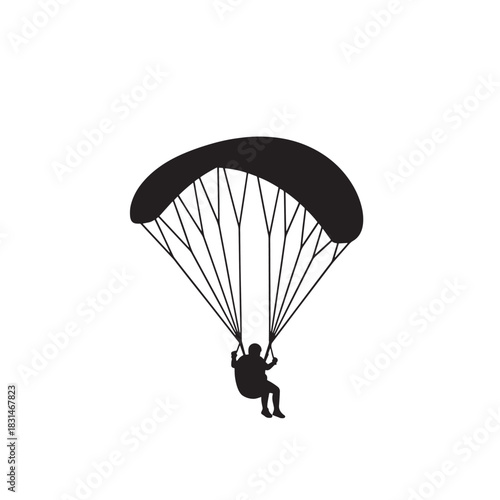 Black Silhouette of a Paraglider Soaring Through the Sky A Thrilling Adventure in the Skies Above
