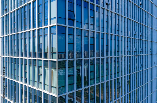 Wallpaper Mural Close up view of modern glass building facade with reflections Torontodigital.ca