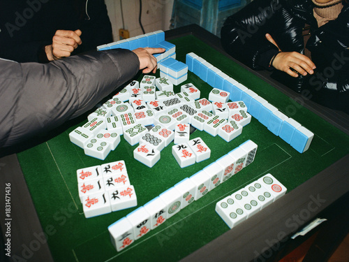 People playing Mahjong