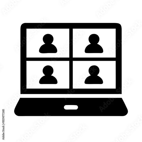 Laptop displaying a video conference call with four participants in a grid layout on the screen view image