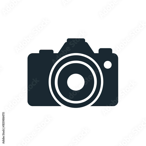 A dark blue minimalist icon of a classic camera with a prominent white lens