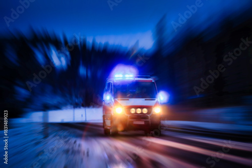 Ambulance on Call at Night. Radial zoom effect, copy space. 