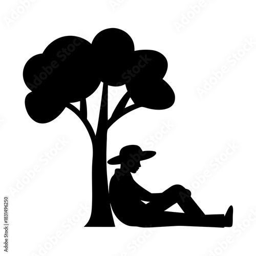 Person wearing a hat sitting under a tree silhouette