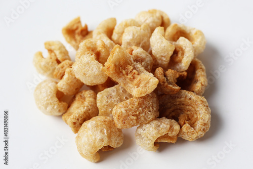 Crispy pork cracklings, a crunchy savory snack.