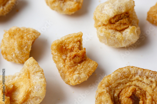 Crispy pork cracklings, a crunchy savory snack.