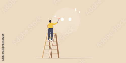 Person on ladder painting dots and sparkles on a wall