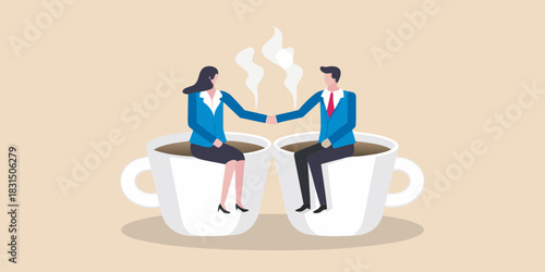 Business handshake between two professionals sitting in coffee cups