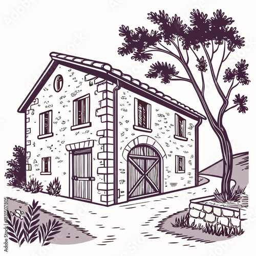 Rustic stone barn with large wooden doors and tree