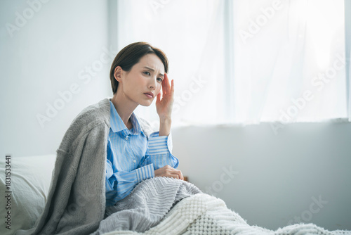 Fotografie 体調不良の女性