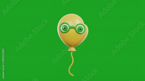 Yellow balloon with green glasses and string on solid green background, playful and anthropomorphic.