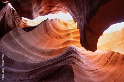 Antelope Canyon offers a breathtaking view with its vibrant rock formations and narrow passageways on Arizonas Indian reservation. The place is a mustvisit for adventure seekers. Popular place in USA.