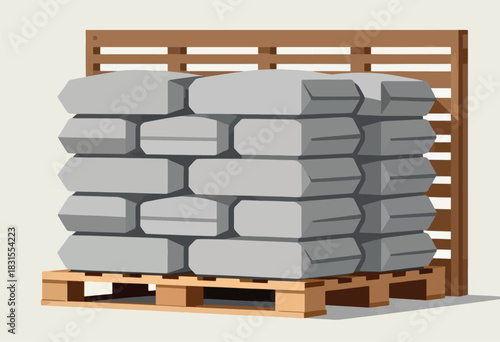 A wooden pallet supports stacked, rectangular blocks with a wooden structure behind. The blocks are gray