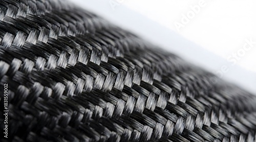 Wallpaper Mural Macro shot of black woven carbon fiber material texture showing diagonal pattern for automotive industry and modern high tech material backgrounds. Torontodigital.ca