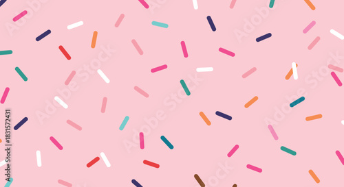 A delightful pink background adorned with a playful scattering of colorful sprinkles, creating a cheerful and whimsical pattern that evokes a sense of fun and joy
