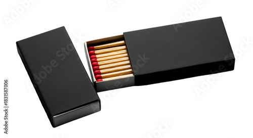 Open black matchbox revealing matches with red tips on dark background
