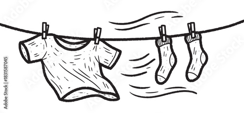 Charming hand-drawn illustration of a t-shirt and socks hanging on a clothesline, blowing in the wind in a rustic, monochrome sketch style