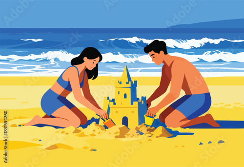 A couple, in swimsuits, build a sandcastle on a beach with the ocean waves in the background