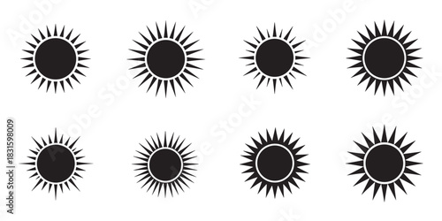 Eight black sun vector graphic icons with various spiky ray designs, a collection of simple silhouette symbols for summer, weather, and light themes