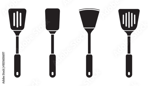 Four black kitchen spatula and turner icons in a minimalist flat vector style, showcasing a collection of essential cooking utensils for flipping and frying food