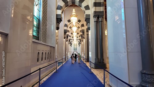 Walking inside the Sultan Qaboos Grand Mosque in Muscat, Oman