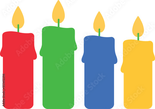 Four colorful wax candles stand closely together brightly lit and glowing