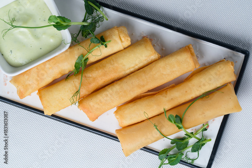 spring rolls with cheese and garlic sauce,