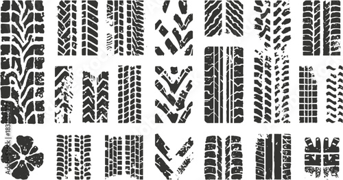 A collection of various tire track patterns in black and white, suitable for design elements and backgrounds, showcasing different tread designs.