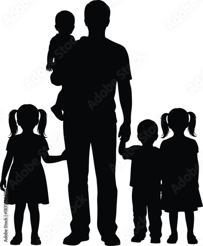 Silhouette of a father holding a baby while standing with three young children around him