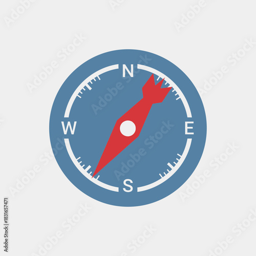 Compass with cardinal directions and a red needle pointing towards north.