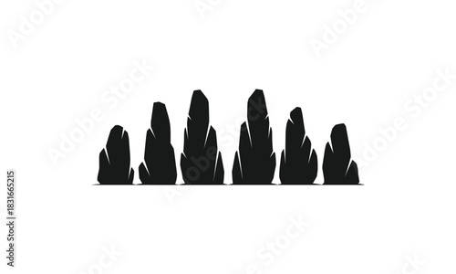 Silhouette of a row of jagged rocks or stones, possibly a rock formation or abstract landscape element.