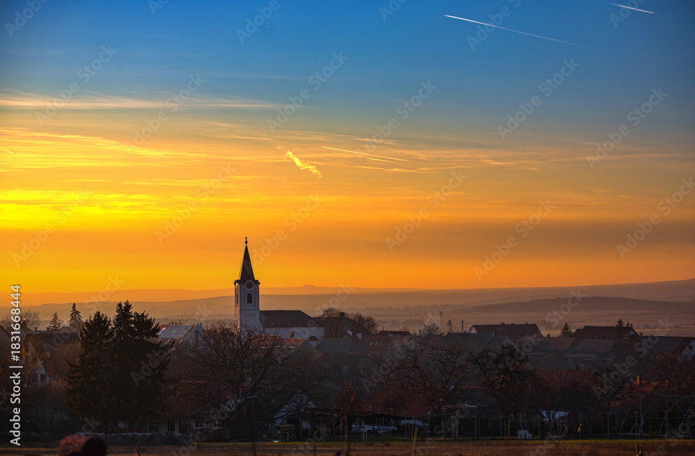 Fototapeta premium Sunset in a small village in Bakony