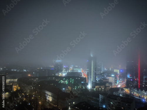 Wallpaper Mural Foggy late autumn Tornimäe cityscape at night, Tallinn, Harjumaa, Estonia, November 2019 Torontodigital.ca