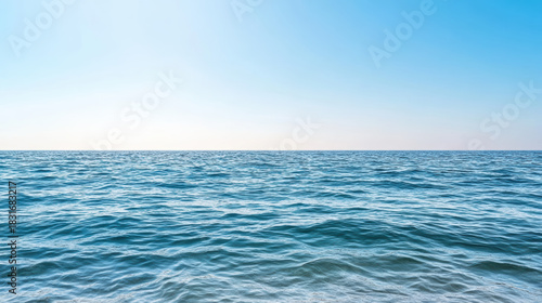 Fototapeta Naklejka Na Ścianę i Meble -  Calm ocean horizon soft waves minimal blue tones serene seascape
