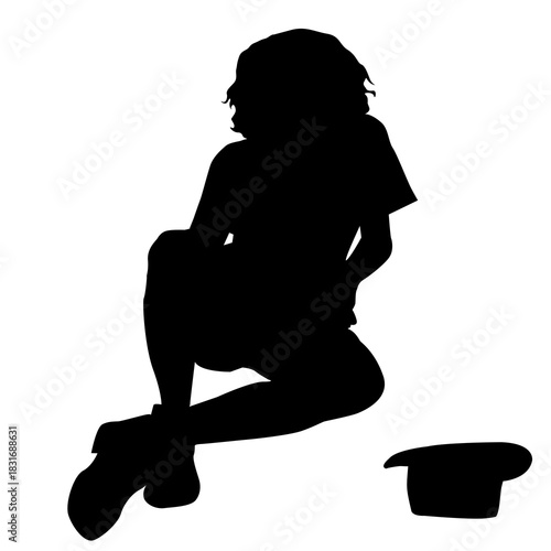 Silhouette of a homeless man with a begging hat