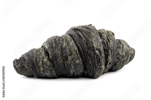 Black charcoal croissant on a light background