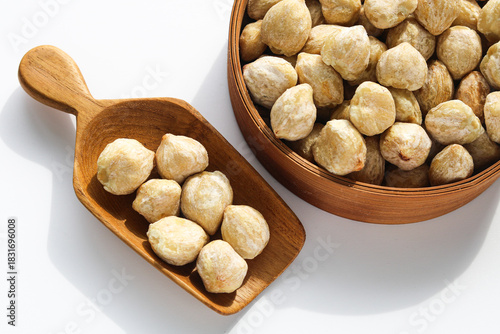 Fototapeta Naklejka Na Ścianę i Meble -  Candlenuts (Kemiri), a key ingredient in Southeast Asian cooking.