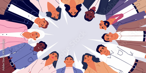 Diverse team of professionals in a huddle looking down with copy space