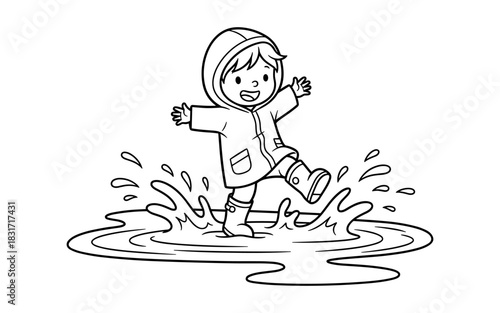 Happy child in raincoat splashing in puddle with joyful expression