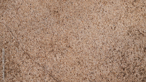 Fényképezés Gravel floor texture background in brown color with left side crack