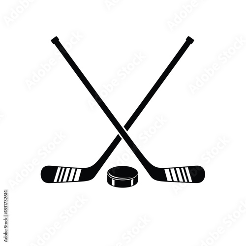 Two hockey sticks crossed with a puck in the center