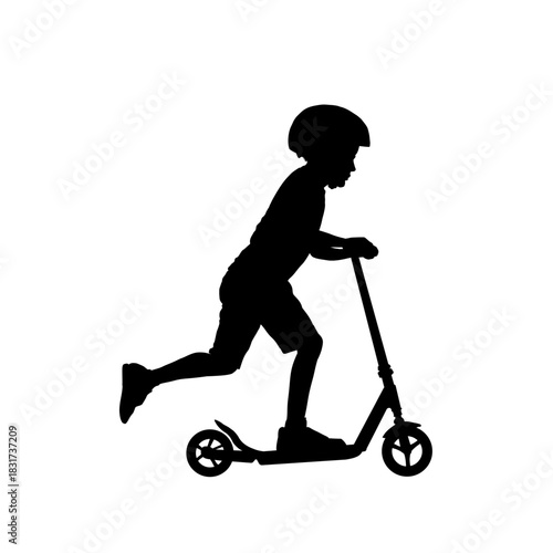 Boy silhouette riding a scooter with helmet