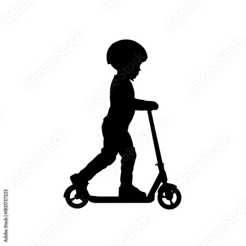 Boy silhouette riding a scooter with helmet