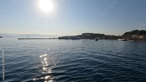 Corfu Town Greece harbor approach with bright sun glare and strong reflections