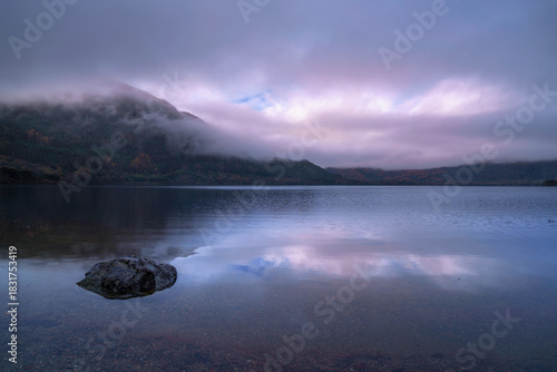 Obraz na plátně Muckross Lake serene landscape on a winter morning after rain, with fogs and drifting clouds over Shehy Mountain in Killarney National Park, Ireland, a Zen‑like sunrise tranquility and relaxation
