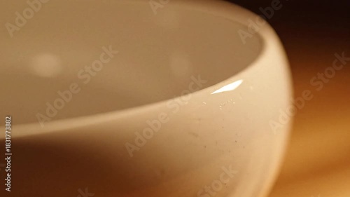 Wallpaper Mural Closeup of a white ceramic bowls rim with soft lighting Torontodigital.ca