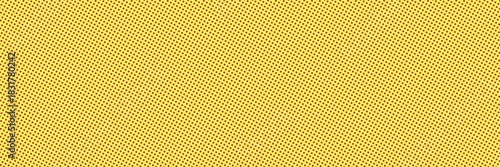 Yellow background with dark pink polka dot pattern, wide background