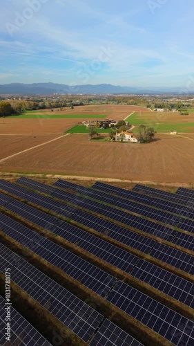 Aerial view of solar panel farm in rural countryside