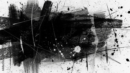 Black and white grunge texture with splatters and brush strokes creating an abstract design art piece