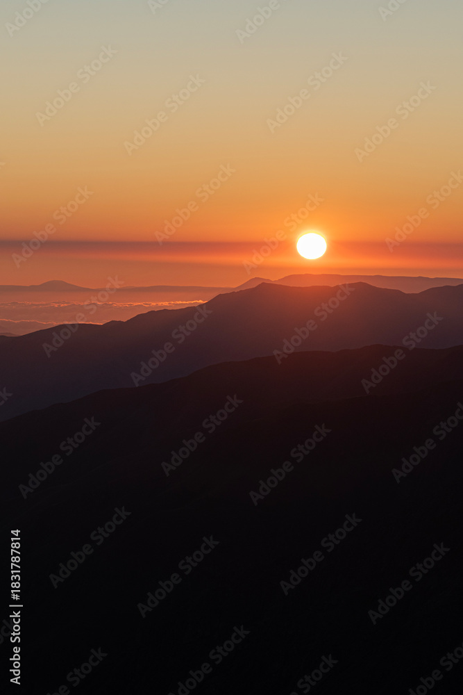Fototapeta premium Watching the sunrise from the Kaçkar Mountains. Sunrise from Kaçkar Peak. Hiking towards Kaçkar Peak in the early morning. Magnificent view from Kaçkar Peak. Rize, Türkiye. 